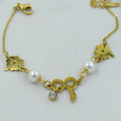 Gilded Bow Clover Pearl Bracelet