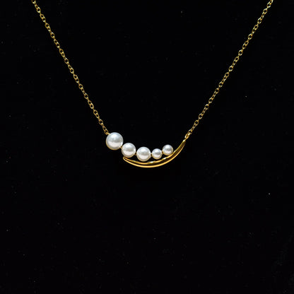 Pearl Arc Glow Necklace