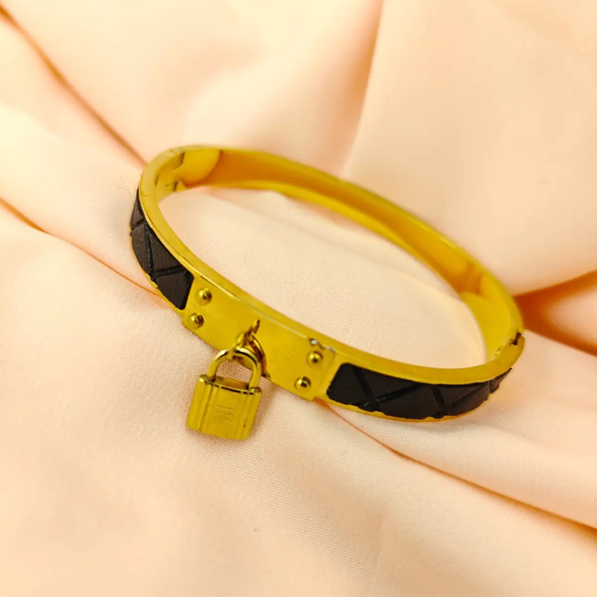 Lock and Rivet Bangle