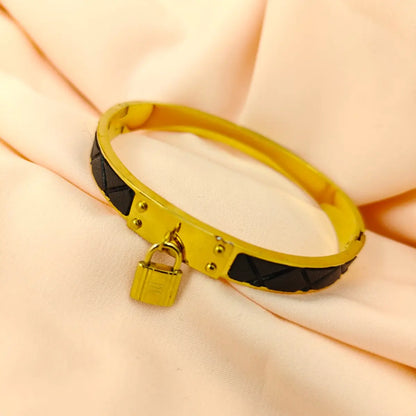 Lock and Rivet Bangle