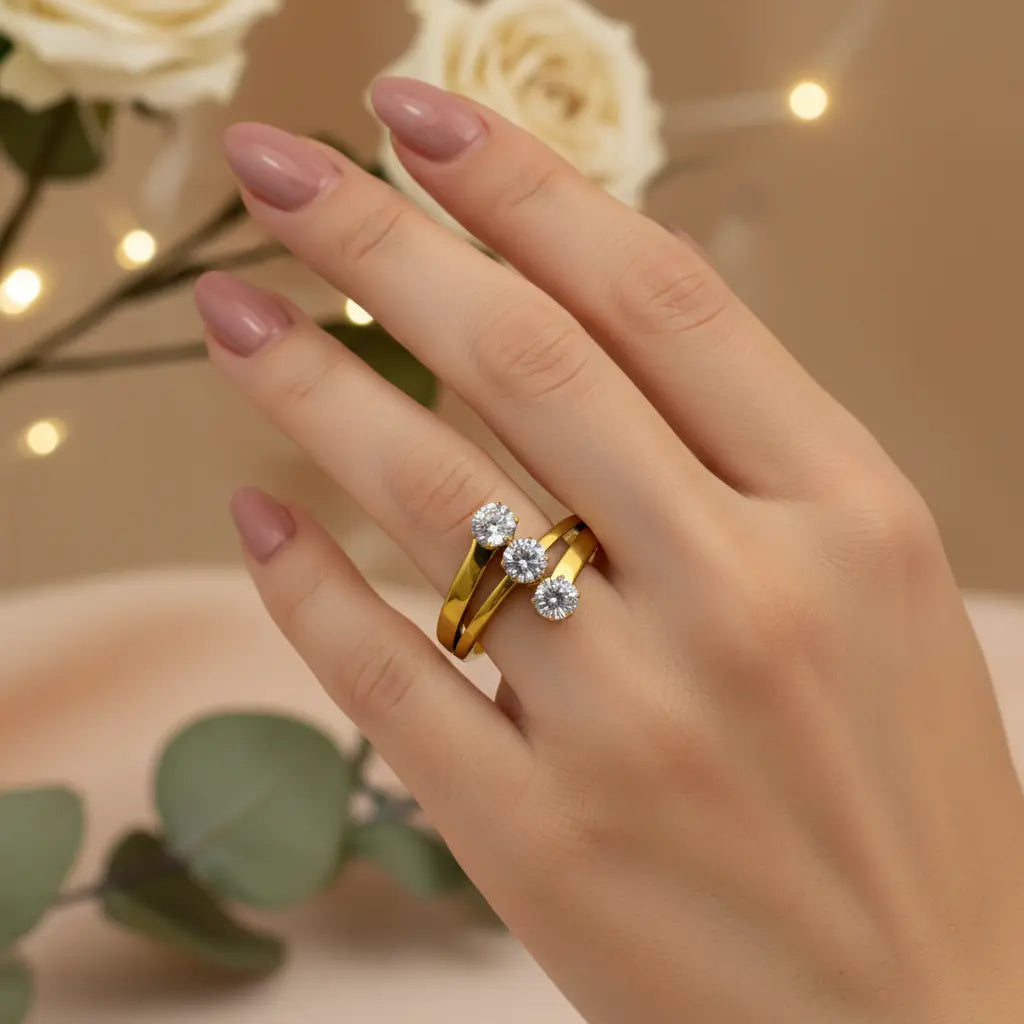 Triple Solitaire Gold Ring