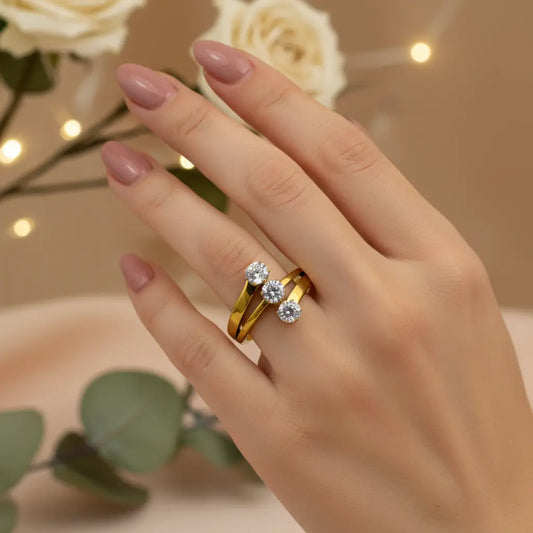 Triple Solitaire Gold Ring