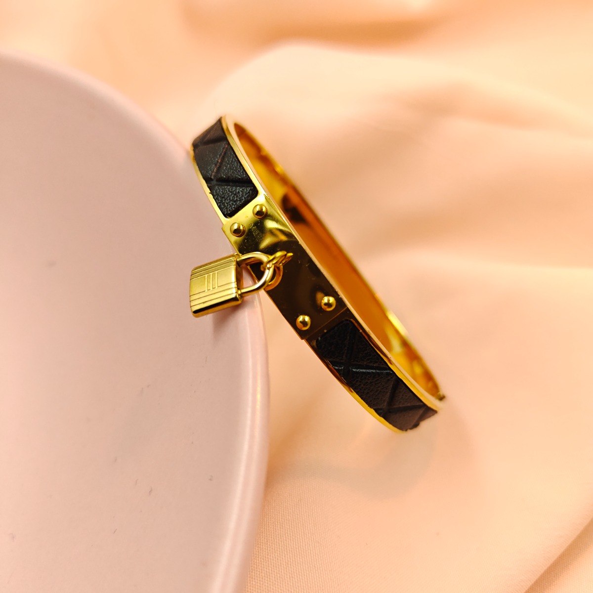 The Lock & Rivet Bangle - Hover