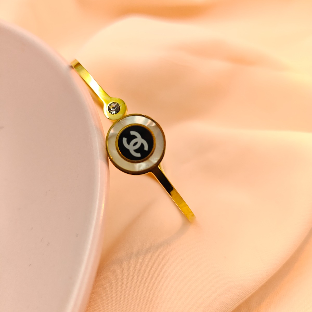 Elegant Emblem Bangle - Hover